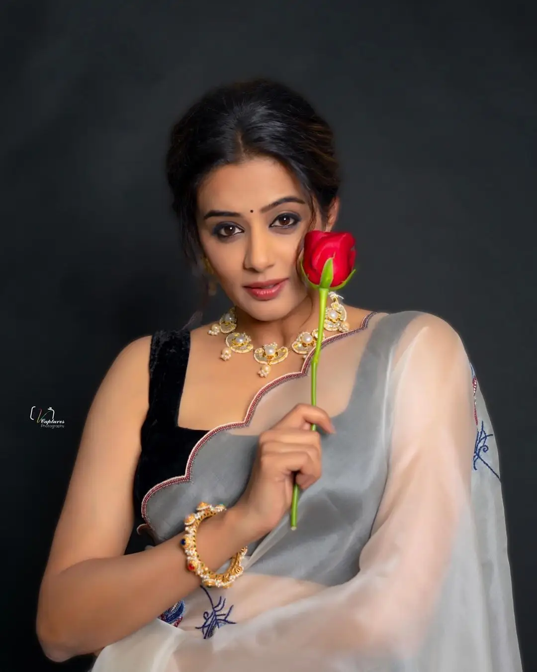 Telugu TV Actress Priyamani In White saree Sleeveless Black Blouse